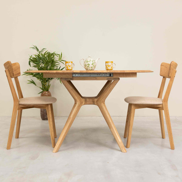 Mesa de comedor redonda y extensible de madera maciza roble Carmen | NordicStory